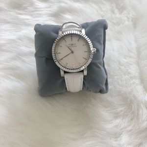 Invicta white strap watch with silver face